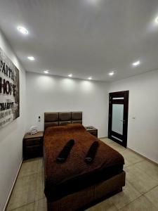 Postel nebo postele na pokoji v ubytování Platinum Court