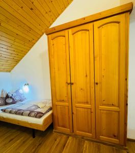 Posteľ alebo postele v izbe v ubytovaní Penzion Familia Antol