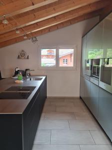 Kuchyň nebo kuchyňský kout v ubytování Jungfrau Penthouse - Aare Jungfrau AG