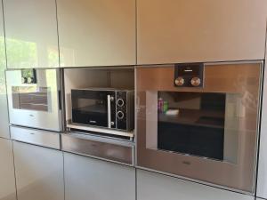 Kuchyň nebo kuchyňský kout v ubytování Jungfrau Penthouse - Aare Jungfrau AG