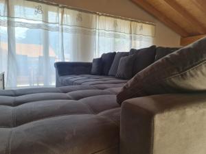 Posezení v ubytování Jungfrau Penthouse - Aare Jungfrau AG