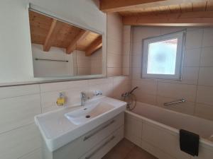 Koupelna v ubytování Jungfrau Penthouse - Aare Jungfrau AG