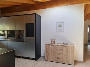 Kuchyň nebo kuchyňský kout v ubytování Jungfrau Penthouse - Aare Jungfrau AG