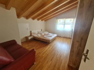 Postel nebo postele na pokoji v ubytování Jungfrau Penthouse - Aare Jungfrau AG