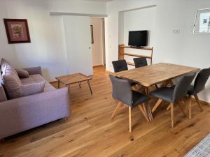 Televízia a/alebo spoločenská miestnosť v ubytovaní Stubnerkogel Apartments