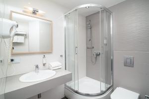 Koupelna v ubytování Antares Hotel