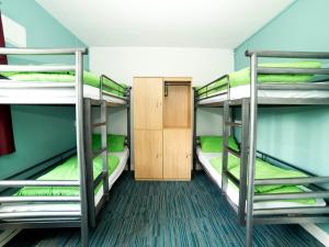 Postel nebo postele na pokoji v ubytování YHA Malham