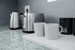 Kaffe- og tefaciliteter på Milo's Sky Grey Guest House - No Load shedding + 3 billeder