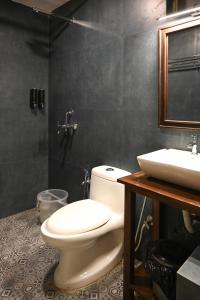 Koupelna v ubytování Arabian Sea Beach Resort