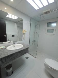Koupelna v ubytování Asfar Hotel Apartments