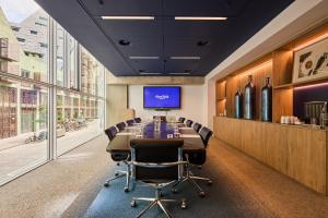 a conference room with a long table and chairs at Room Mate Aitana, Amsterdam in Amsterdam +94 photos