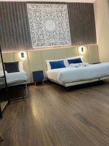 Postel nebo postele na pokoji v ubytování Brignole Diamond Rooms