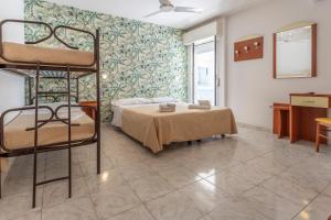 Postel nebo postele na pokoji v ubytování Hotel Clipper + 37 fotografií