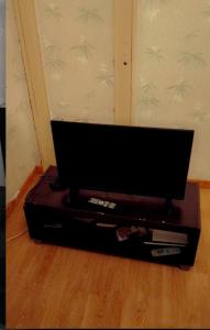 TV/trung tâm giải trí tại Chambre simple dans une maison