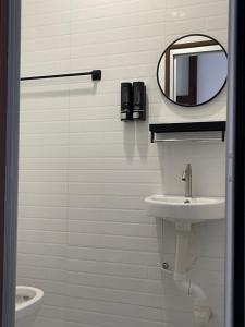Bagno di TDOZE Hotel