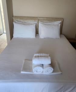 A bed or beds in a room at Villa Panorama