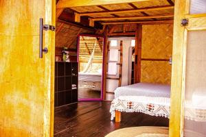 Postel nebo postele na pokoji v ubytování Duon Baler - Seconds from Sabang beach, your peaceful escape + 34 fotografií