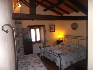 Posteľ alebo postele v izbe v ubytovaní B&B Borgo Valagnesi casa Annarita