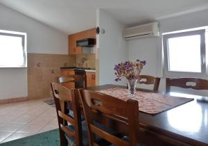 Kuchyňa alebo kuchynka v ubytovaní Apartments Makic