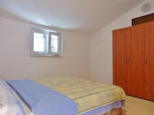 Posteľ alebo postele v izbe v ubytovaní Apartments Makic