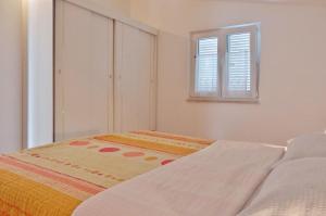 Posteľ alebo postele v izbe v ubytovaní Apartments Makic