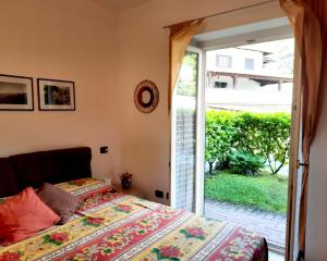 En eller flere senge i et værelse på My Holidays Casa Luca