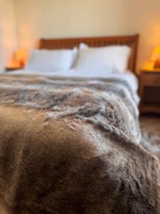 Postel nebo postele na pokoji v ubytování Le Preyet