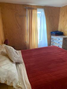 Postel nebo postele na pokoji v ubytování hospedaje Isla Paraiso