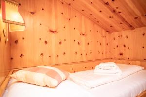 Katil atau katil-katil dalam bilik di Ferienhaus Zauberberg - Magie der Alpen - by Loewenherz