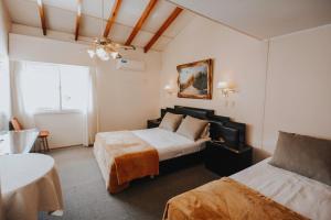 Postel nebo postele na pokoji v ubytování Hotel Nutibara + 37 fotografií