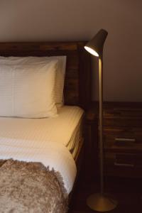 Postel nebo postele na pokoji v ubytování Snowline Haven New-Gudauri, Block-3