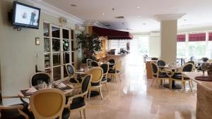 Restaurant o un lloc per menjar a Batavia Apartments, Hotel & Serviced Residences