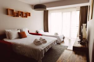 מיטה או מיטות בחדר ב-Snowline Haven New-Gudauri, Block-3