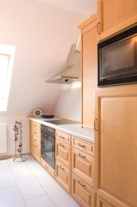 Nhà bếp/bếp nhỏ tại Ferienwohnung an der Allee +2 ảnh