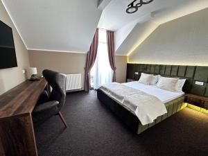 Кровать или кровати в номере Pensiunea Hangita +8 фотографий