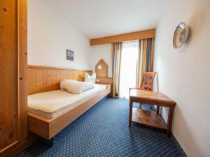 Łóżko lub łóżka w pokoju w obiekcie Holiday Home Kleewein by Interhome