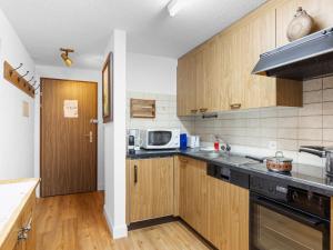 Kuchyň nebo kuchyňský kout v ubytování Apartment Alba by Interhome