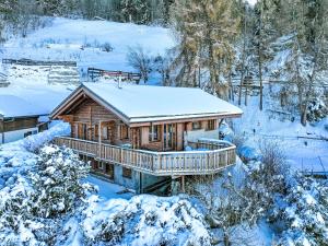 a log cabin in the snow at Chalet La Bergerie by Interhome in Nendaz