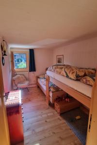 Postel nebo postele na pokoji v ubytování Apartment Bachhüsi by Interhome