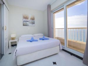 Katil atau katil-katil dalam bilik di Apartment Les Roquetes by Interhome