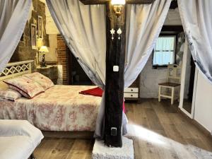 A bed or beds in a room at Apartment Potes Vinon - Cabaña by Interhome