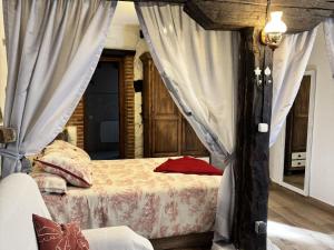 A bed or beds in a room at Apartment Potes Vinon - Cabaña by Interhome
