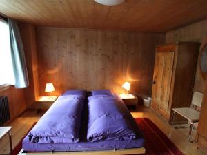 Postel nebo postele na pokoji v ubytování Apartment Lena- Chalet by Interhome