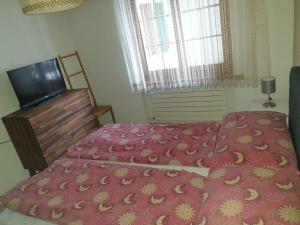 Postel nebo postele na pokoji v ubytování Apartment Gletscherhorn II - Tapia by Interhome