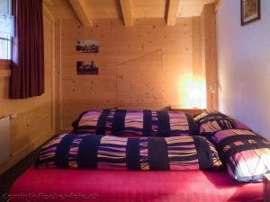 Postel nebo postele na pokoji v ubytování Apartment Am Bächli by Interhome
