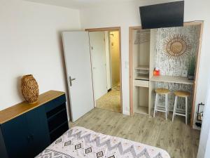 Postel nebo postele na pokoji v ubytování Studio centre-ville République