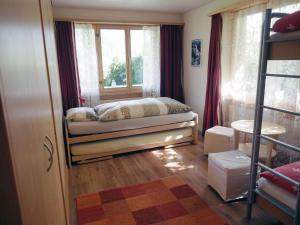 Voodi või voodid majutusasutuse Apartment Am Ryschbächli by Interhome toas