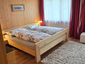 Voodi või voodid majutusasutuse Apartment Am Ryschbächli by Interhome toas