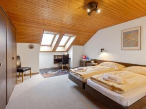 Postel nebo postele na pokoji v ubytování Apartment Eiger Residence Apt-A-425 by Interhome