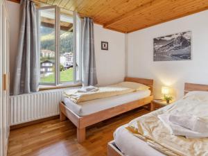Postel nebo postele na pokoji v ubytování Apartment Bristol Apt-18 by Interhome